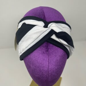 Stripe pattern headband on mannequin head.